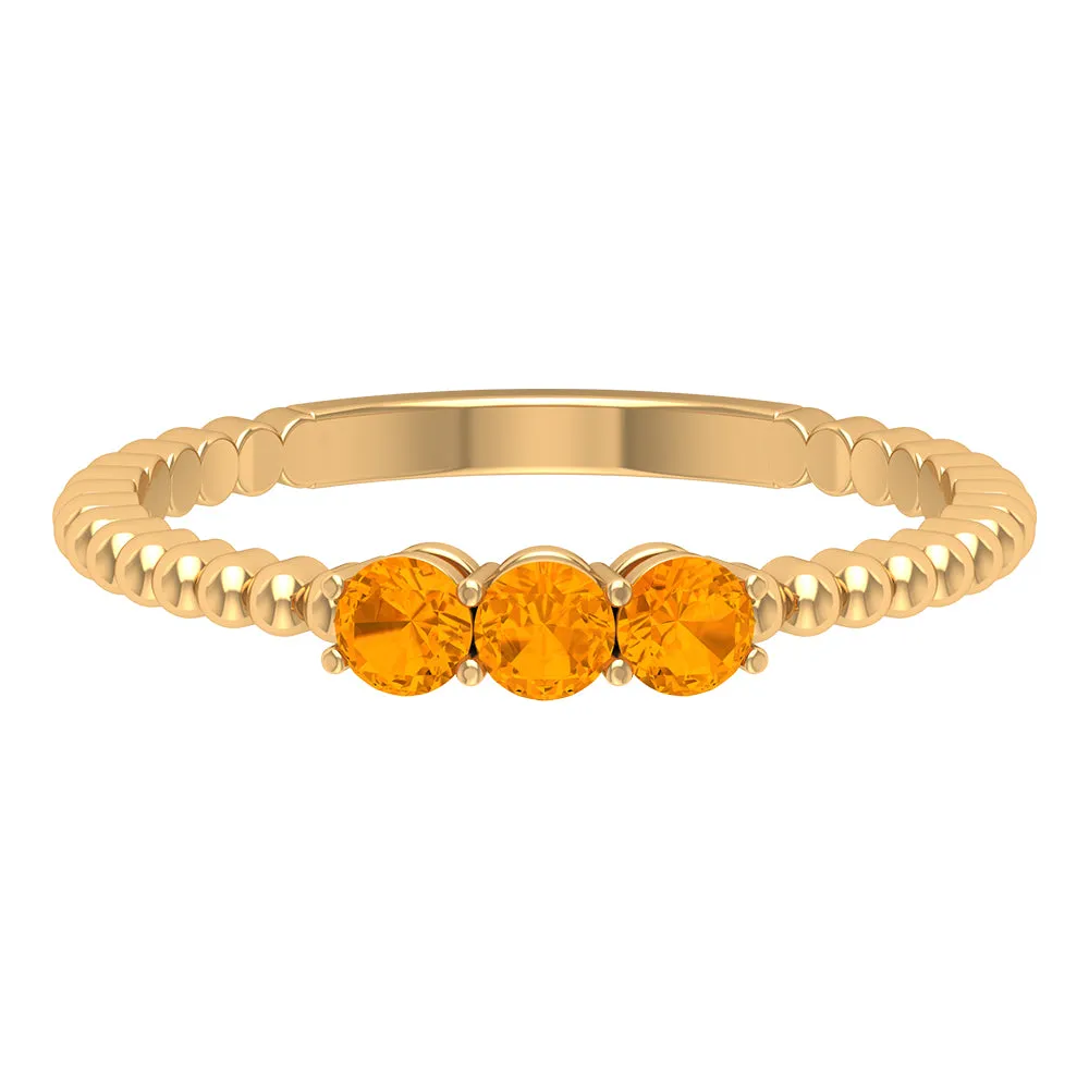 1/2 CT Orange Sapphire and Gold Beaded Three Stone Promise Ring