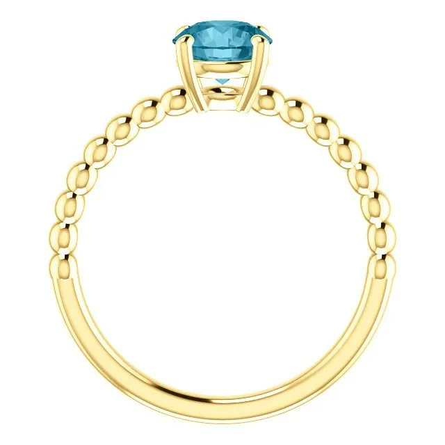 14KT GOLD 1.05 CT LONDON BLUE TOPAZ BEADED SOLITAIRE RING