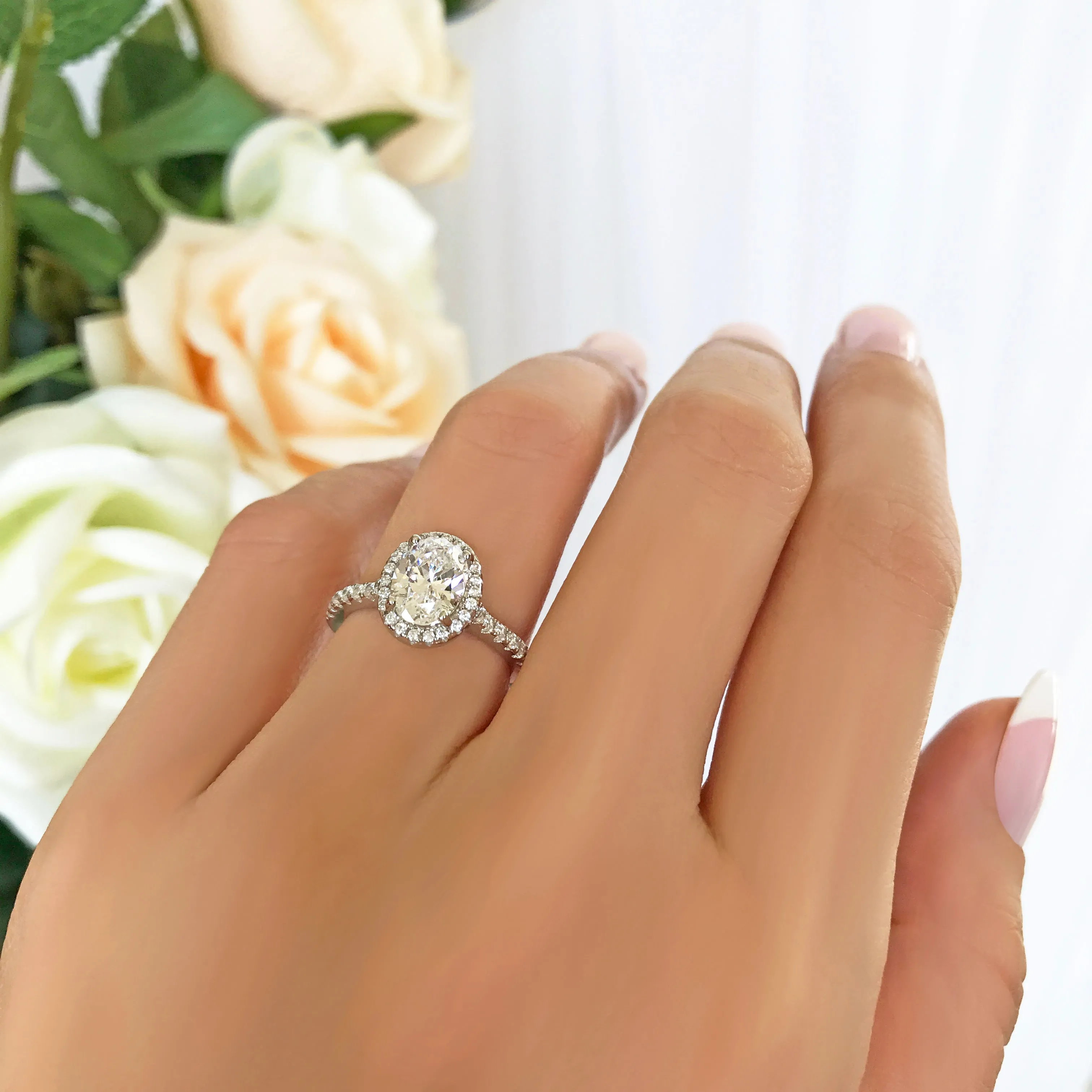 1.5 ctw Oval Halo Ring