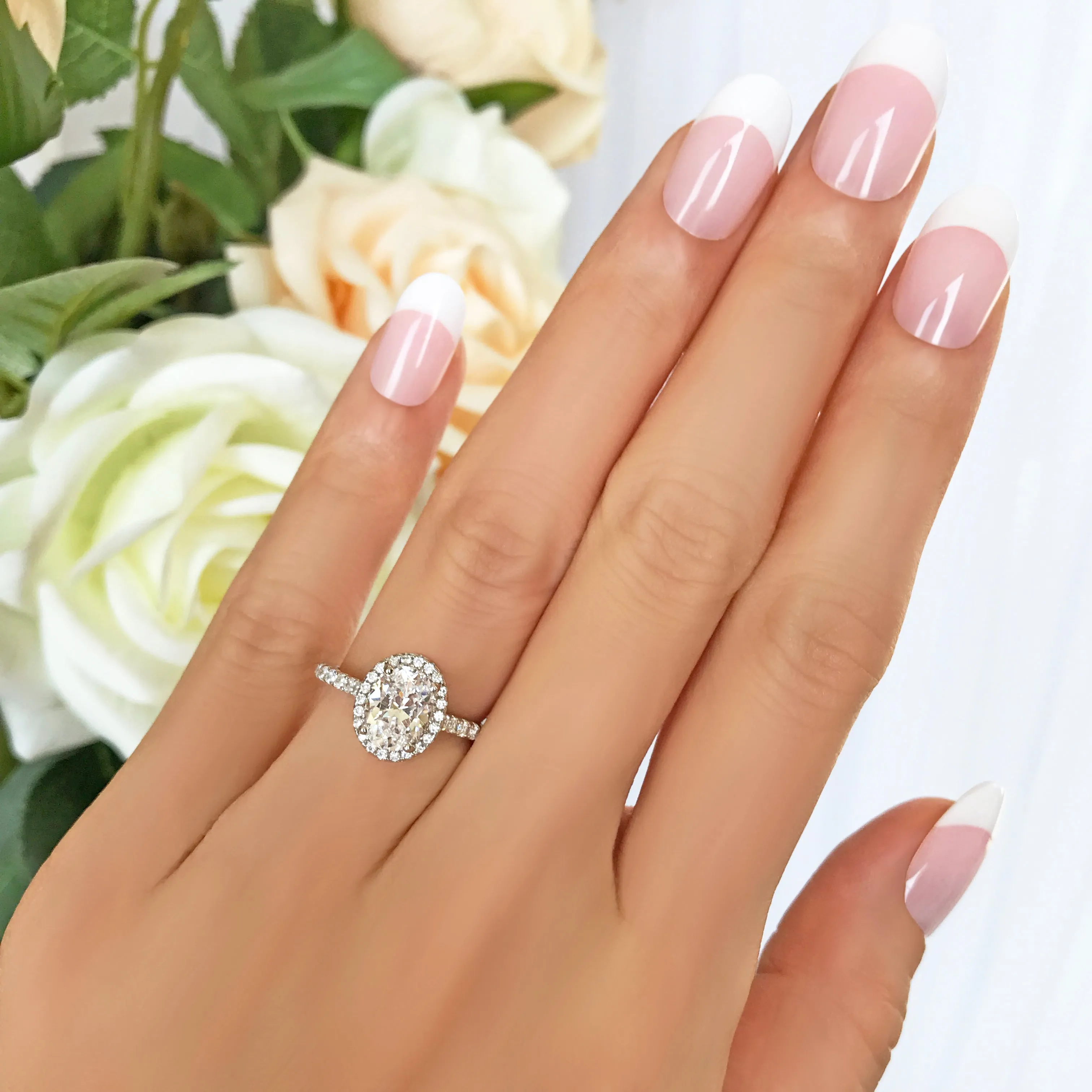 1.5 ctw Oval Halo Ring