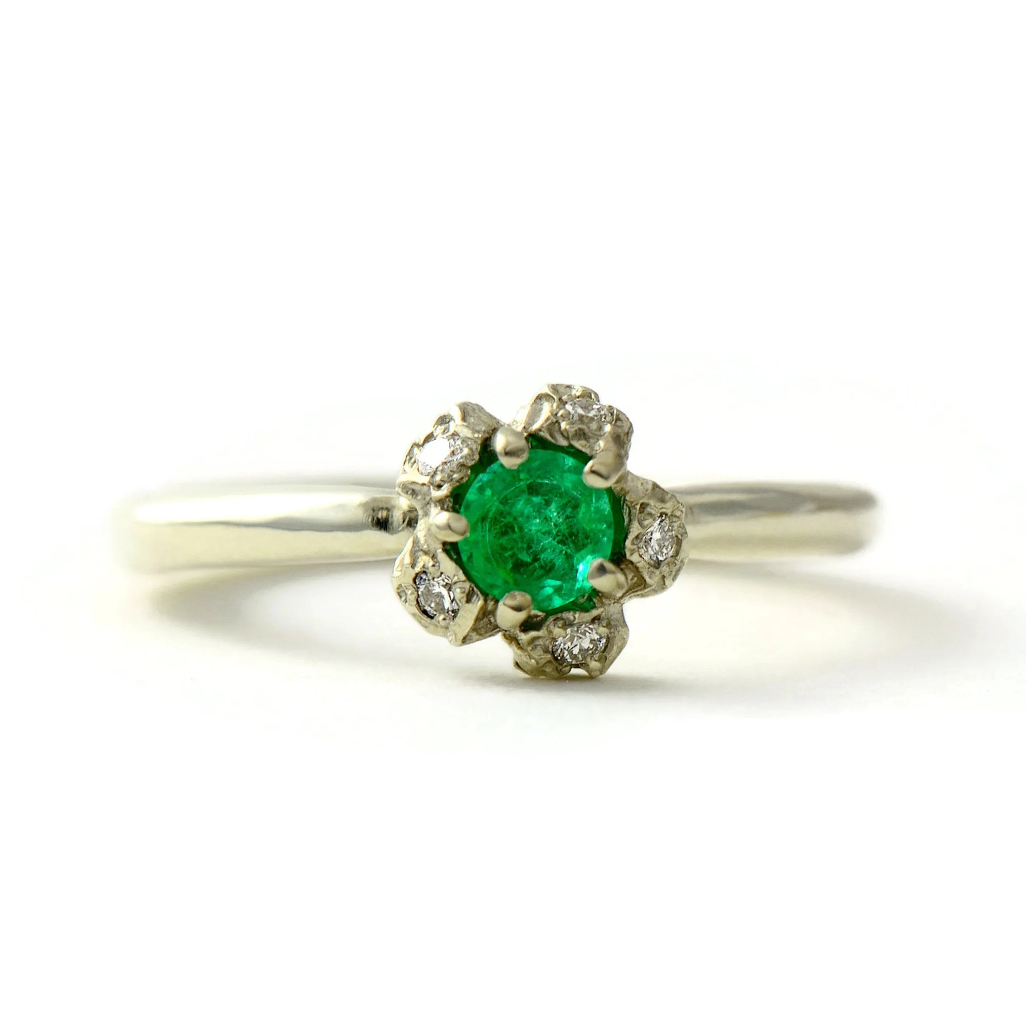 Natural Colombian emerald solitaire engagement ring  with a diamond cluster set in gold peppercorn