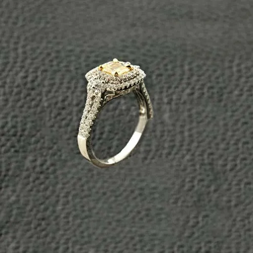 Radiant Yellow Diamond Ring with a Double Halo