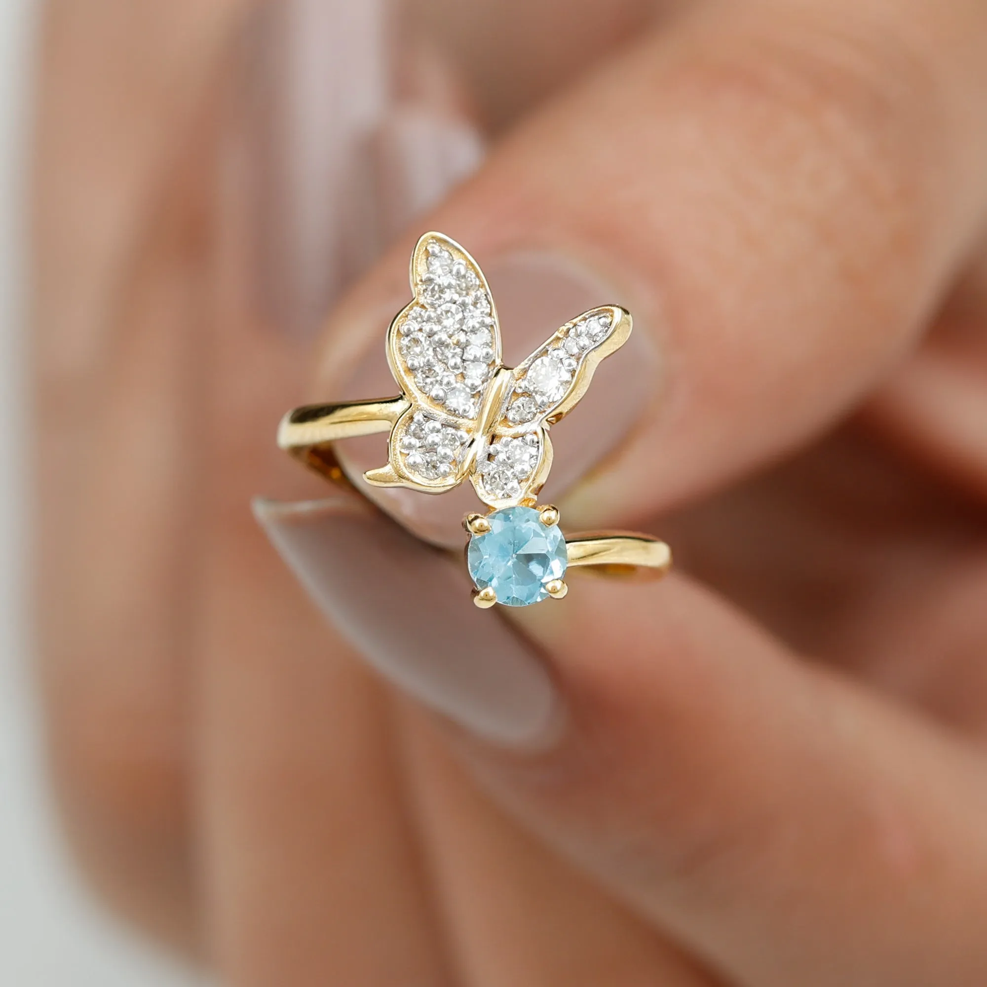 Swiss Blue Topaz and Diamond Butterfly Ring