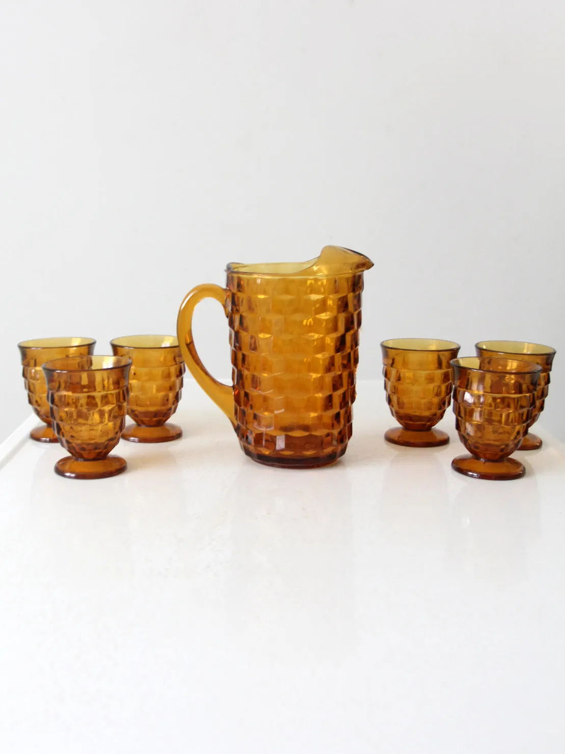 vintage amber glass tumblers and pitcher set