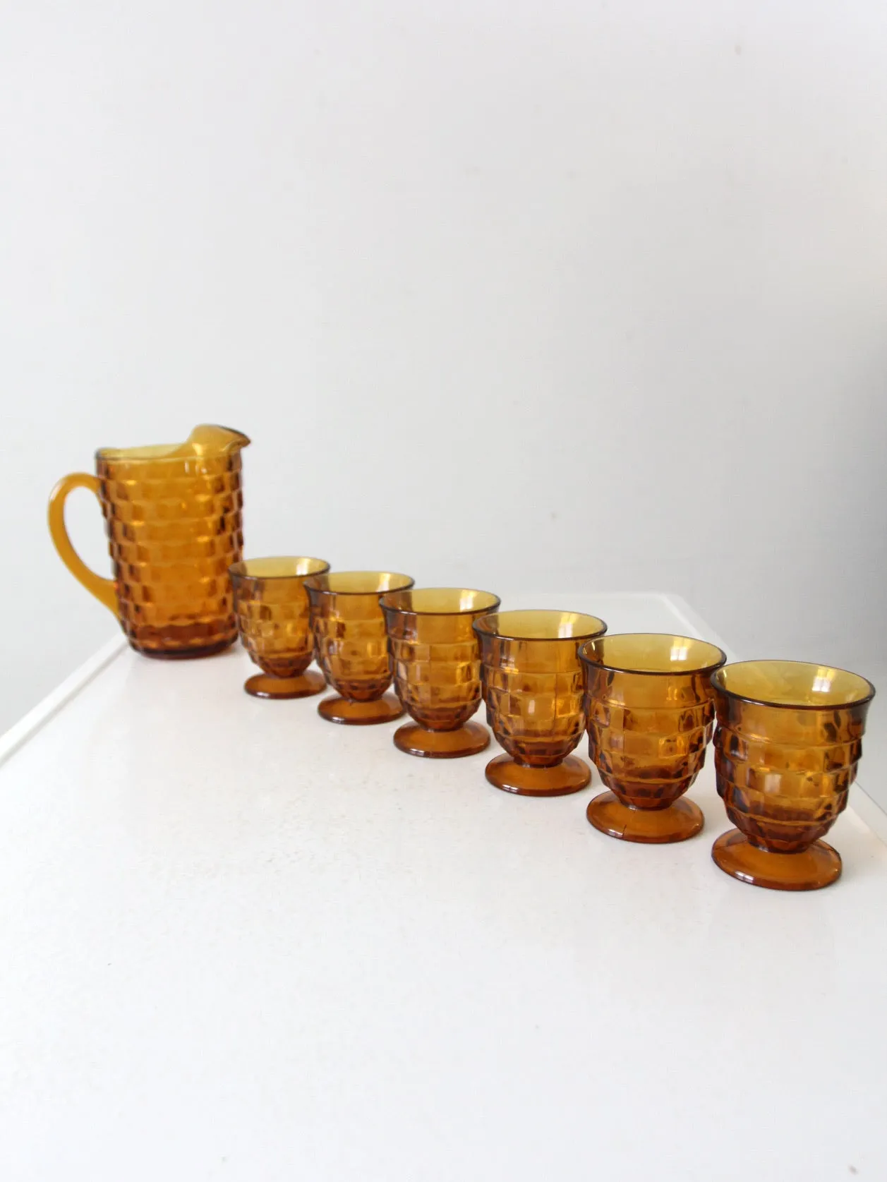 vintage amber glass tumblers and pitcher set